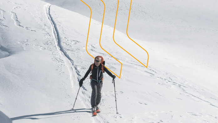 Uomo sulle piste con sci elettrici E-Skimo